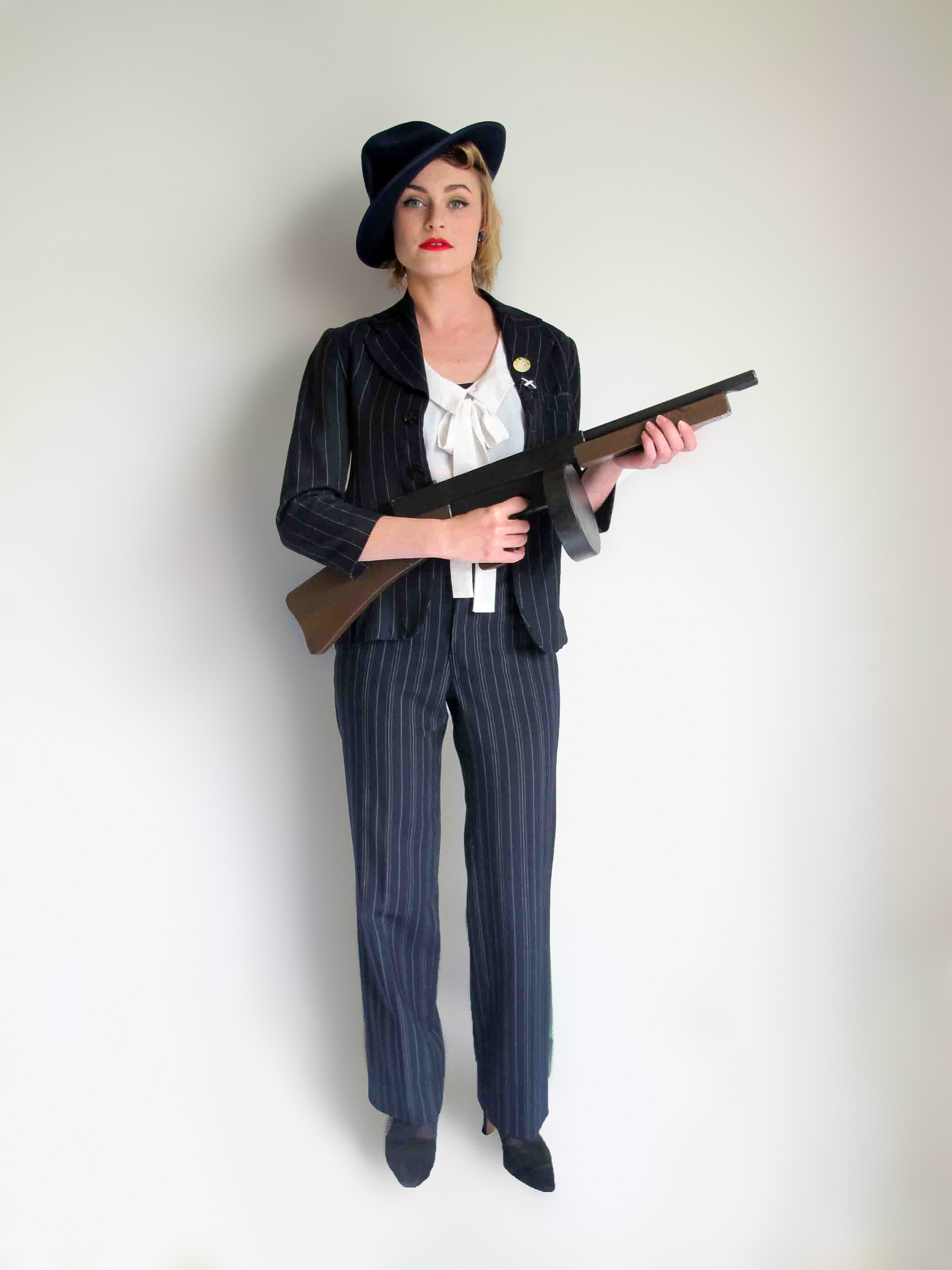 Female Gangster First Scene NZ�s largest prop & costume hire company.